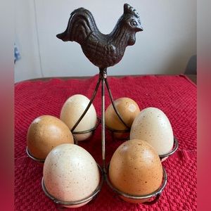 Metal decorative egg holder.